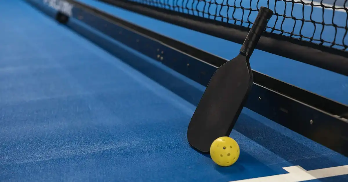 Outdoor pickleball courts in a Northern Kentucky park at golden hour